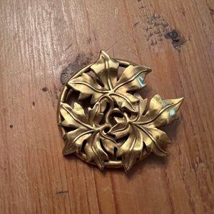 Gold floral brooch